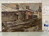 Front view of oil painting with water bottle for scale, shows snowy village houses and dirt road.