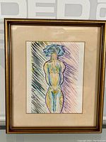 Full view of framed pastel painting of an abstract female figure with blue hair and multicolored diagonal background