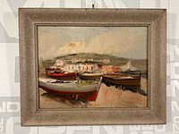 Full view of framed oil painting depicting boats on shore with landscape background.