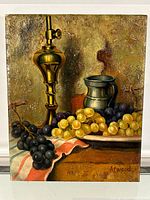 Full view of the oil painting showing grapes, brass vessel, pewter pitcher, and signed by Atwood.