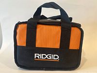 Photo of the Ridgid branded orange and black soft carrying bag with handles
