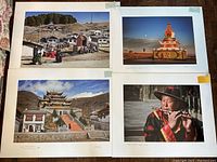Overview of four matted inkjet prints laid out on wooden floor.