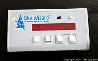 Front view of the Orion Sky Wizard Model 3 electronic finder showing LED display, logo, and control buttons.