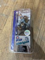 Front view of baseball collectable figure in original blister packaging