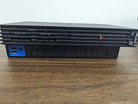 Sony PlayStation 2 console front view showing memory card slots and controller ports