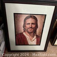 Framed color portrait print showing Jesus Christ, signed by artist Del Parson, with 19x23 inch frame.
