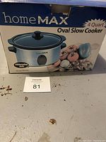 Box for homeMAX 4 Quart Oval Slow Cooker featuring product image and model number NSC390