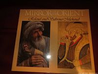 Front cover of the book showing the title 'Mirror of the Orient' with a photo of an elderly man in a turban and an Islamic miniature painting portrait.