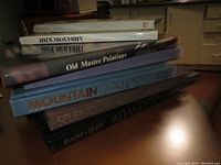Stack of 6 coffee table books showing titles National Geographic, Russian Art, Old Master Paintings, Mountain Worlds, Splendor, Readers Digest Atlas