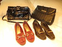 Group photo showing all items: black snakeskin handbag, black leather briefcase, and two pairs of women's size 8 shoes (brown leather loafers and red suede tassel loafers) on a white surface.