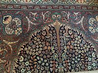 Central medallion and surrounding floral pattern