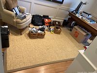 Full view of the sisal floor rug installed in a room with furniture around it.