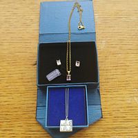 Set of 14K gold plated sterling silver amethyst necklace and matching pierced earrings in blue box.