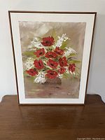 Front view of the framed painting showing the poppy bouquet artwork.