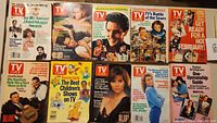Collection of 9 TV Guide magazines and 2 Cable Guides arranged showing colorful covers from 1988-1989 with celebrities and TV themes.