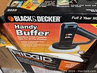 Box front showing Black & Decker Handy Buffer packaging with product image and details.