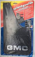 Front angle of one black GMC splash guard in original packaging showing product details and mounting accessories.