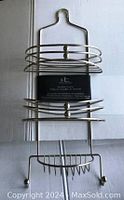 Full view of the Hotel Collection shower caddy showing double tier design with curved soap dish, two hooks at the bottom, and hanging hook at the top.