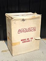 Original cardboard box labeled 'Acoustic Dynamics Model No. 150 Contains 2', showing outer packaging condition.