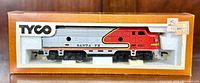 Front view of TYCO HO scale Santa Fe locomotive in original window box.