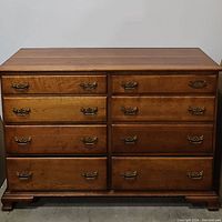 Front view of the six-drawer dresser showing overall design, finish and hardware.
