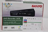 Front of retail box showing Sanyo branding, product image and labeling for DVD Recorder/VCR 2-way dubbing