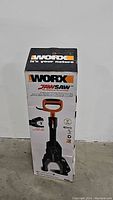 Full view of the unopened Worx JawSaw product box showing the brand, model, and product image.