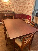 Full view of extended tabletop with leaves inserted