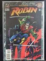 Cover of DC Comics Robin Annual #3 comic book showing Robin leaping with sword, Batman and background characters in action.