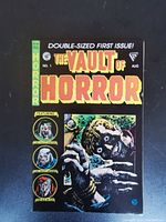 Front cover of The Vault of Horror No. 1 showing horror monster art and title