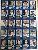 Front of uncut sheet showing 30 Blue Jays baseball cards each with player headshot and autograph, arranged in 6 columns by 5 rows.