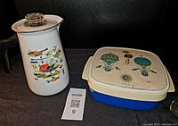 Photo of the percolator and insulated serving dish side by side showing design and scale.