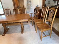 Six chairs arranged around a dining table showing style and finish