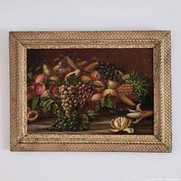 Full view of the antique fruit still life oil painting in its frame.