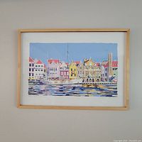 Full view of the framed lithograph showcasing the waterfront scene with buildings and boats in pastel colors.