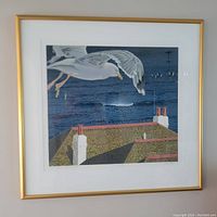 Framed lithograph artwork showing seagulls flying over rooftops and water.