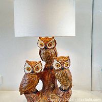 Full view of the MCM owl lamp with three owls on a log and white lamp shade, showing the full piece and base dimensions.