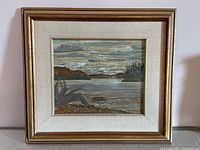 Full view of framed painting mounted on wall, showing overall composition and frame