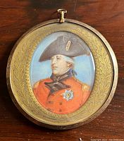 Front view of circular framed miniature portrait