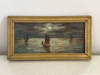Frontal view of entire painting and frame showing three sailboats under moonlight