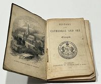 Antique softcover book opened to front illustration depicting Glasgow Cathedral from the Necropolis and the title page showing publication details from 1856 by Francis Orr and Sons, Glasgow.