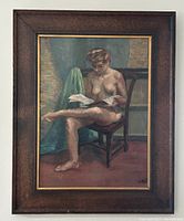 Full view of framed oil painting showing the dark wood frame and nude figure reading