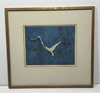 Full view of framed print on wall, showing mat and frame.