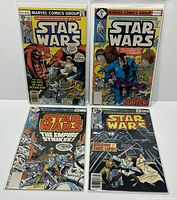 Four Marvel Star Wars comic books laid out, issues #11, 16, 18, and 21, all bagged and boarded with visible cover art.