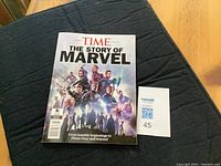 Front cover of TIME magazine special edition titled 'The Story of Marvel' showing various Marvel superheroes and title text.