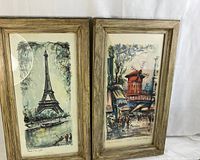 Framed watercolours showing Paris landmarks, Eiffel Tower and Moulin Rouge scenes.