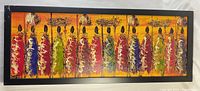 Wide shot of the full painting showing multiple colorful tribal figures against a yellow and orange background with a black frame.