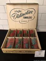 Full set of eight Dominion Glass Company poinsettia tumblers in original box divided by cardboard sections