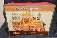Box featuring the product image and indicating it is a Cracker Barrel Handmade Christmas fiberoptic train light