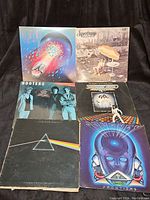 Top left shows Electric Light Orchestra album ELO 4 and Supertramp album Crisis? What Crisis?